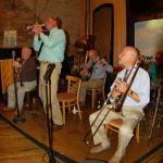 Chris Stind takes a solo
(left to right:  Kim Cusack, Chris Stind, Jack Kuncl, Tom Bartlett)